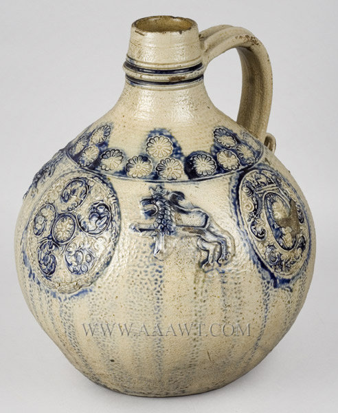Stoneware, Pitcher, Jug, Westerwald, Globular, Crowned Lions Passant
Large capacity, incised flowers, applied roundels of grapes, leaves and portraits
Germany
Circa 1650, entire view
